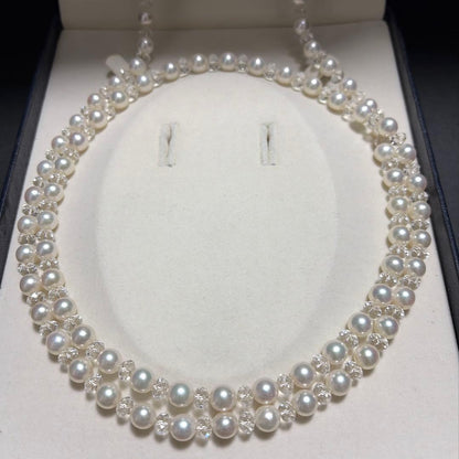TASAKI Pearls Vari Aoyama 120cm pearl necklace with crystal clasp and silver marking on white background