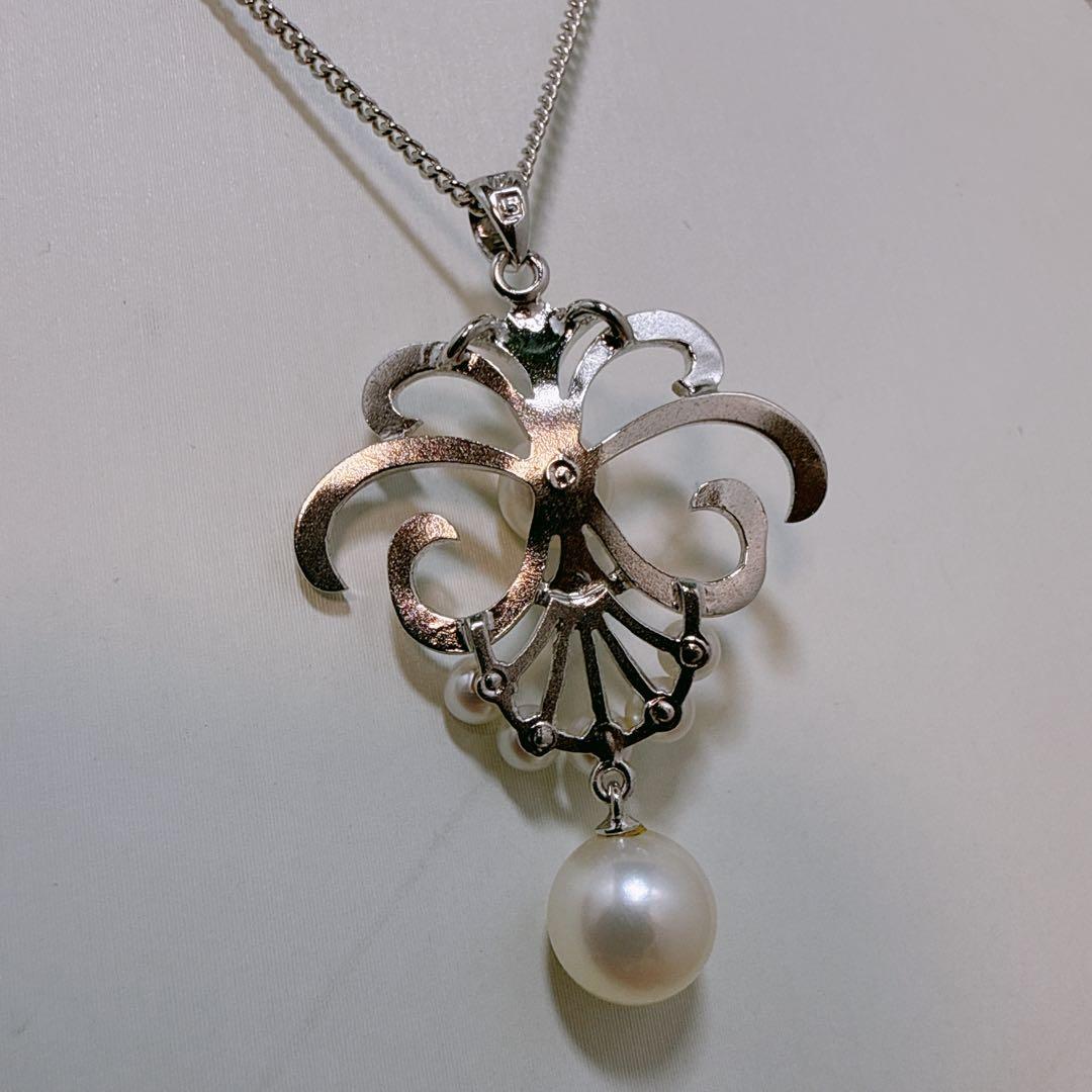 MIKIMOTO silver necklace with Akoya pearl and lily-shaped silver pendant on 40 cm metal chain
