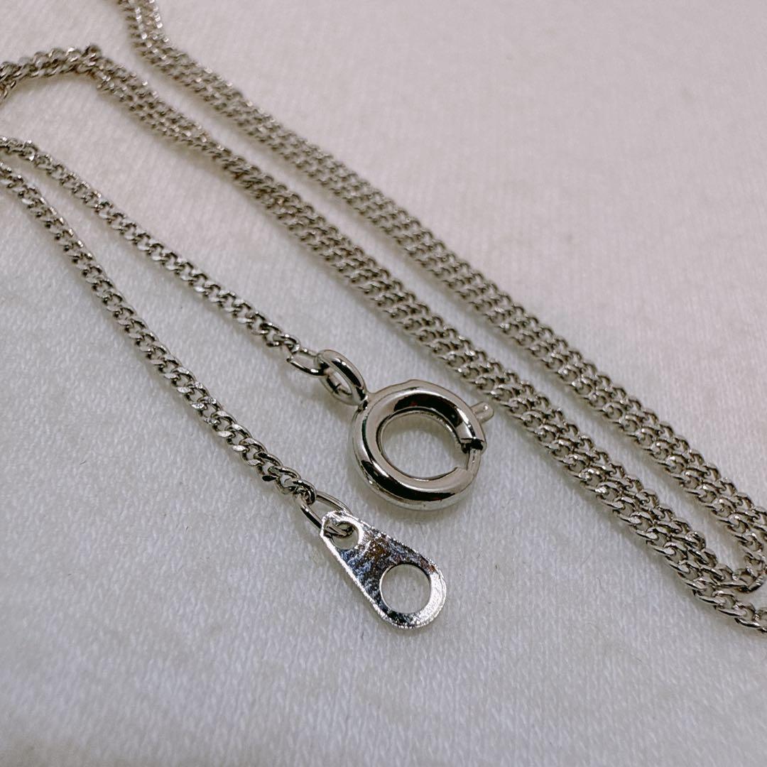 MIKIMOTO silver necklace with Akoya pearl and lily-shaped silver pendant on 40 cm metal chain