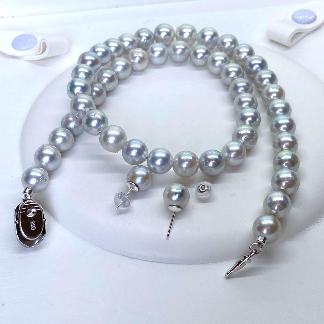 Akoya pearl necklace and earrings set with blue-grey nearly round pearls on silver 925 chain