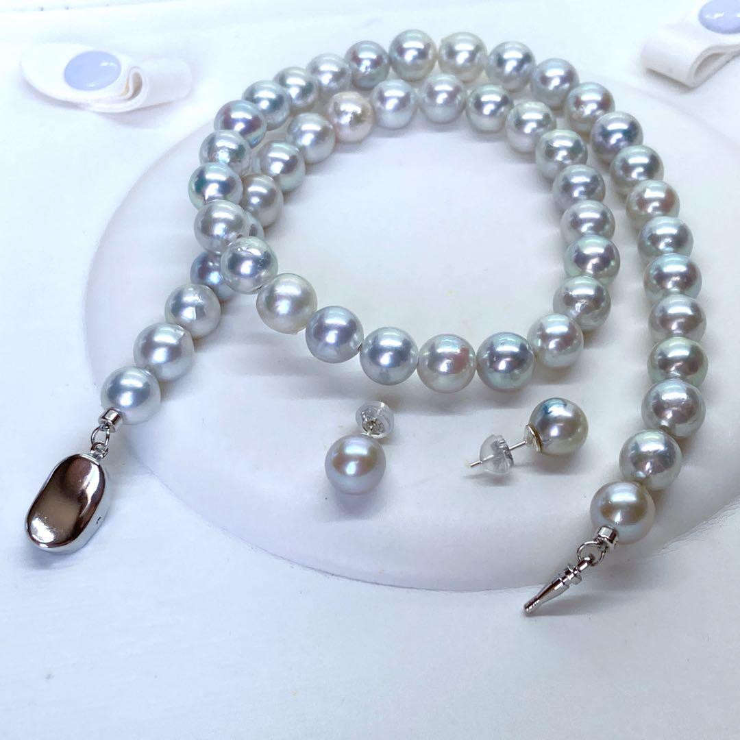 Akoya pearl necklace and earrings set with blue-grey nearly round pearls on silver 925 chain
