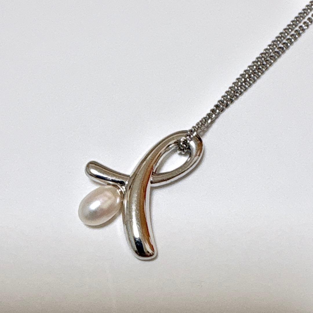 Tasaki genuine pearl necklace with silver pendant, 41cm length, pearls sized 5.7x4.5mm