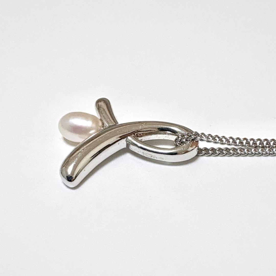 Tasaki genuine pearl necklace with silver pendant, 41cm length, pearls sized 5.7x4.5mm