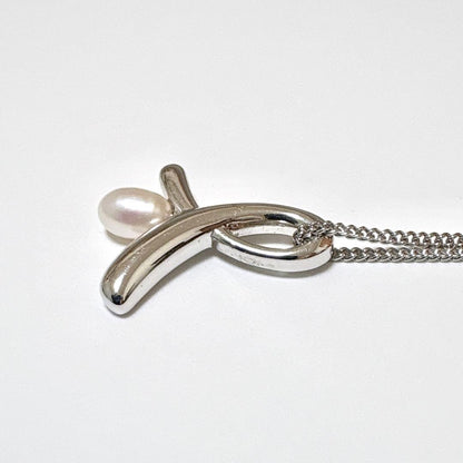 Tasaki genuine pearl necklace with silver pendant, 41cm length, pearls sized 5.7x4.5mm