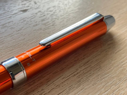 Evolt 2+1 Stripe Orange Pilot pen with black and red ballpoint and mechanical pencil in aluminum body