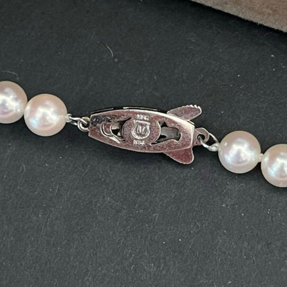 MIKIMOTO K14WG semi-long Akoya pearl necklace with white pearls and white gold clasp, 55cm length