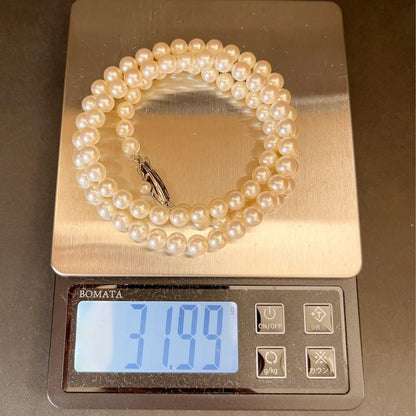MIKIMOTO K14WG semi-long Akoya pearl necklace with white pearls and white gold clasp, 55cm length