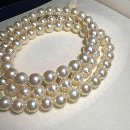 Mikimoto Akoya pearl necklace measuring 56cm with white and cream tone pearls sized 6.4 to 6.9mm