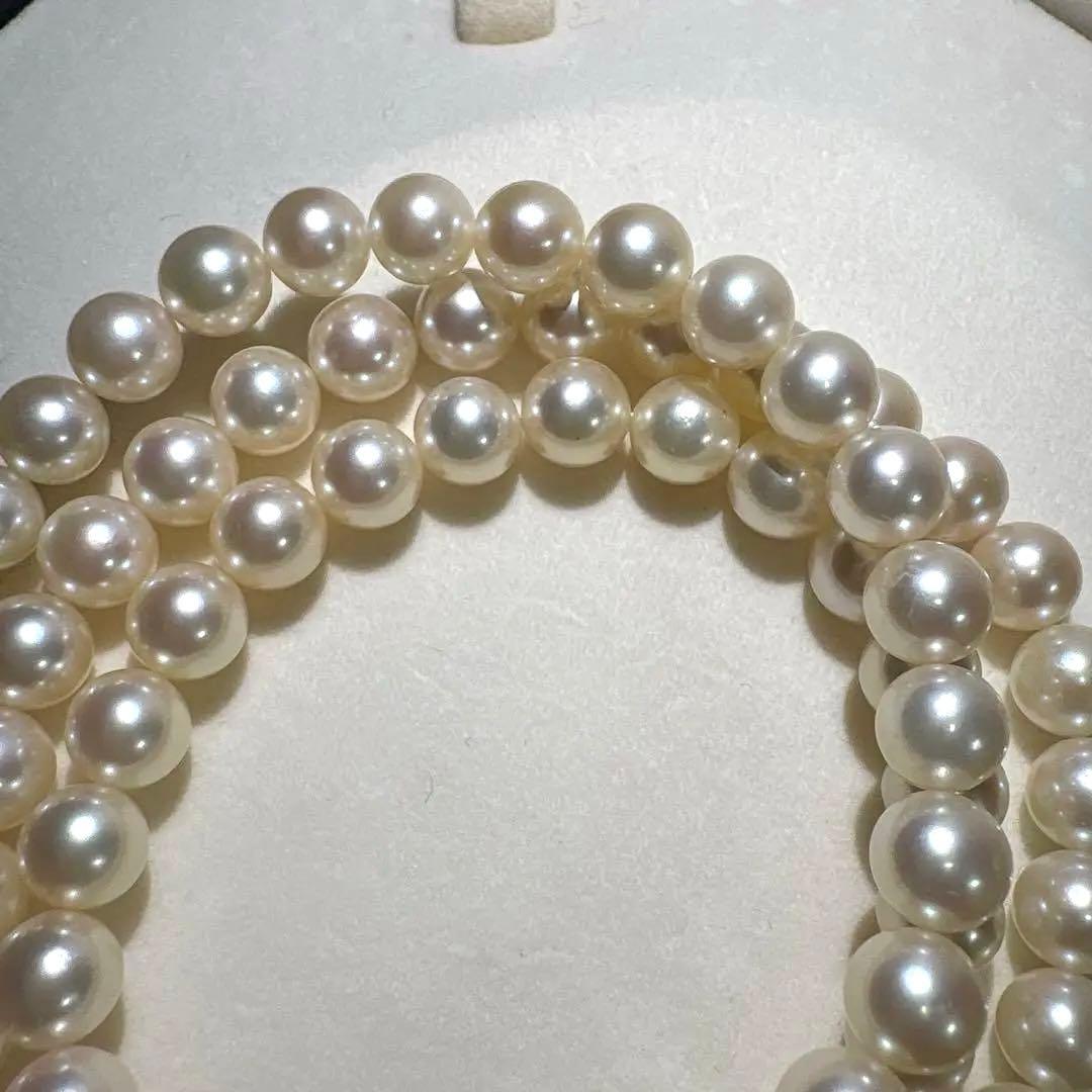 Mikimoto Akoya pearl necklace measuring 56cm with white and cream tone pearls sized 6.4 to 6.9mm