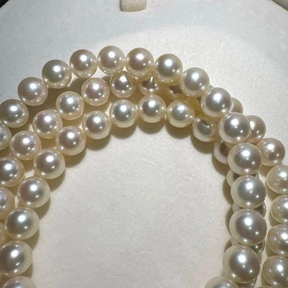 Mikimoto Akoya pearl necklace measuring 56cm with white and cream tone pearls sized 6.4 to 6.9mm