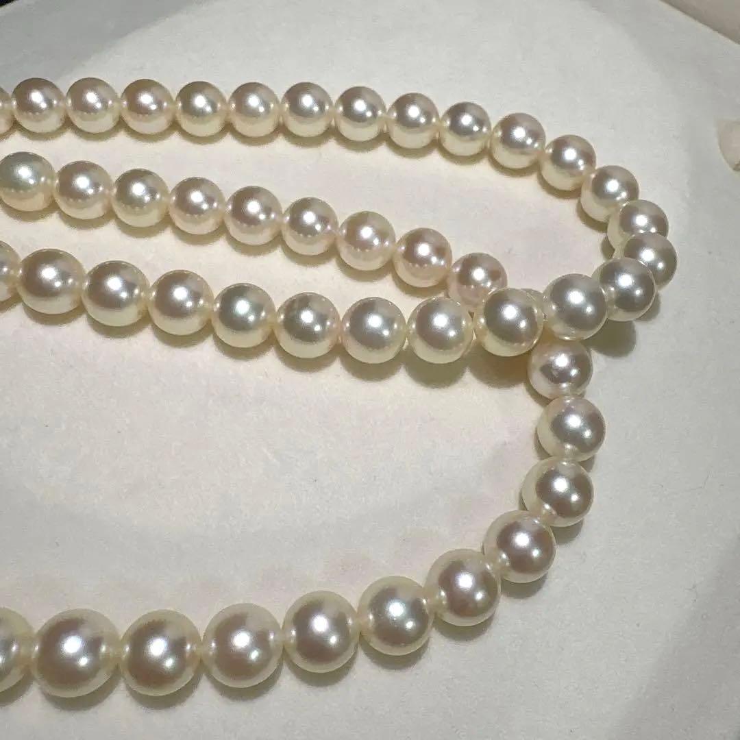 Mikimoto Akoya pearl necklace measuring 56cm with white and cream tone pearls sized 6.4 to 6.9mm