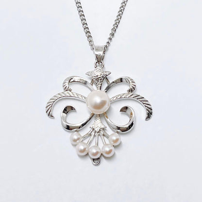 Mikimoto pearl necklace pendant with silver chain and round pearls measuring 2.9-5.8mm