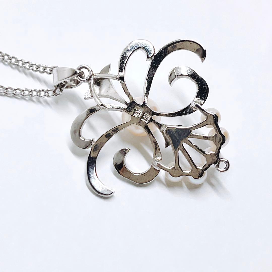 Mikimoto pearl necklace pendant with silver chain and round pearls measuring 2.9-5.8mm
