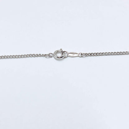 Mikimoto pearl necklace pendant with silver chain and round pearls measuring 2.9-5.8mm
