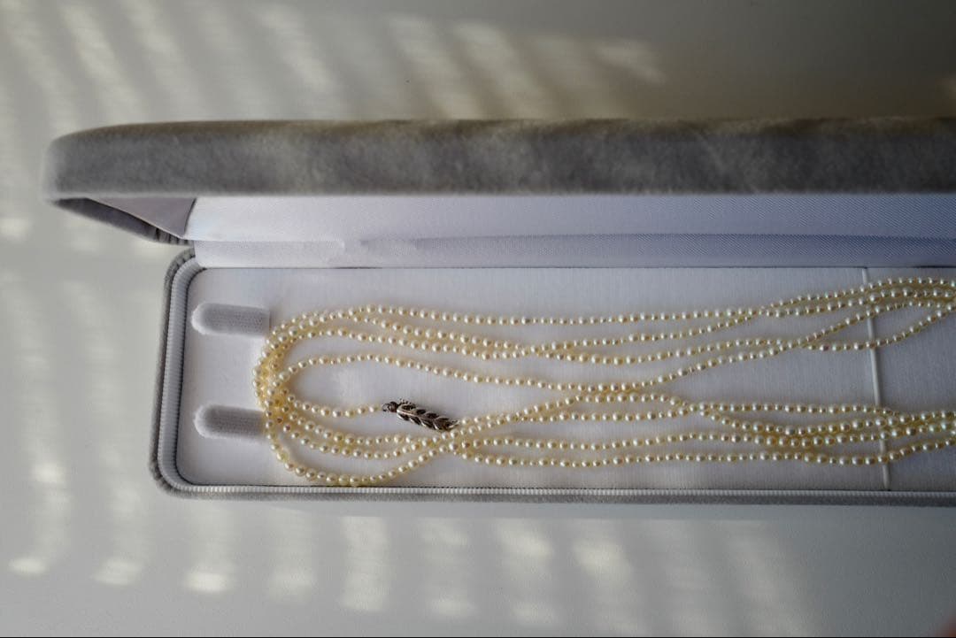 New Akoya pearl necklace with very small 2-3mm ivory pearls on a 64 inch silver chain