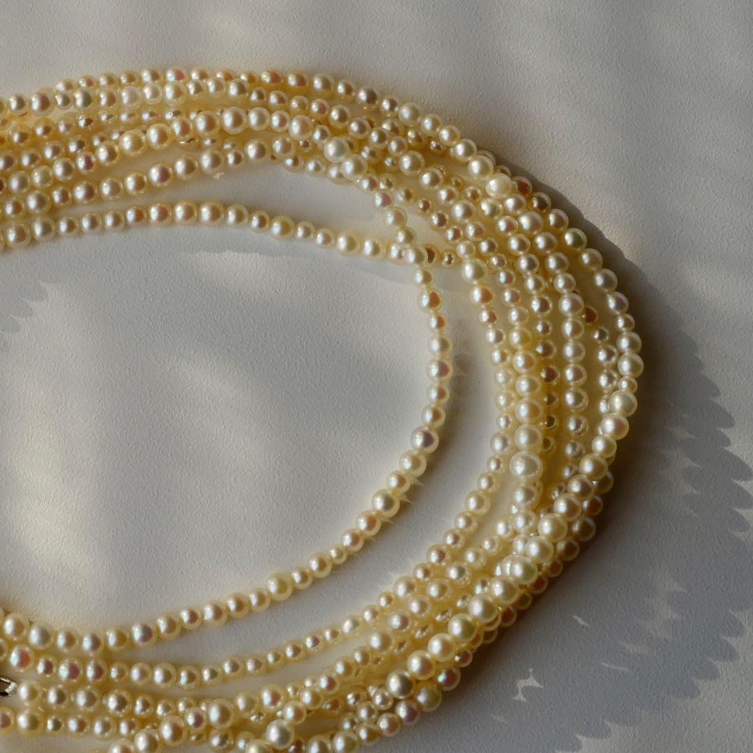 New Akoya pearl necklace with very small 2-3mm ivory pearls on a 64 inch silver chain