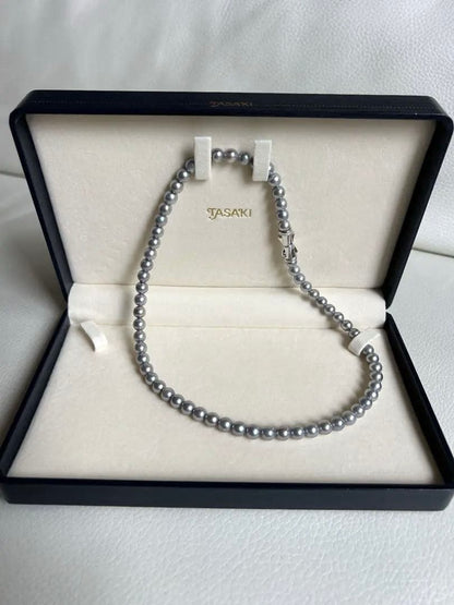 Tasaki Necklace featuring 6.4 mm round gray pearls with pink to green color tones on a 42 cm chain