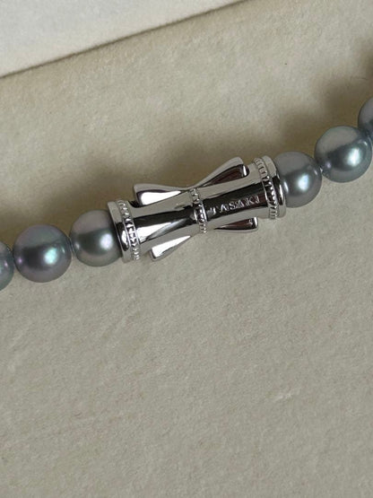 Tasaki Necklace featuring 6.4 mm round gray pearls with pink to green color tones on a 42 cm chain