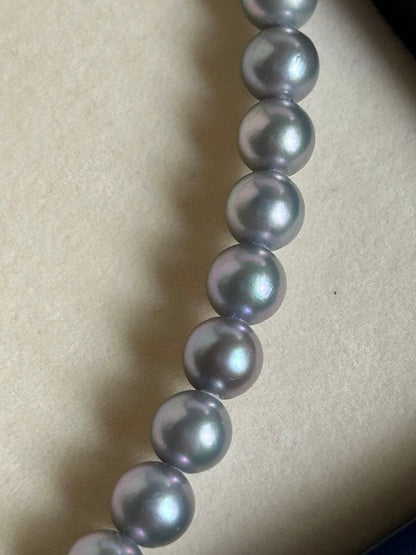 Tasaki Necklace featuring 6.4 mm round gray pearls with pink to green color tones on a 42 cm chain