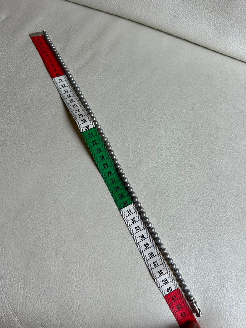 Tasaki Necklace featuring 6.4 mm round gray pearls with pink to green color tones on a 42 cm chain