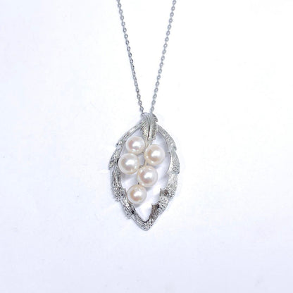 MIKIMOTO pearl necklace top featuring 6.2-6.8mm pearls on silver material shown on white background