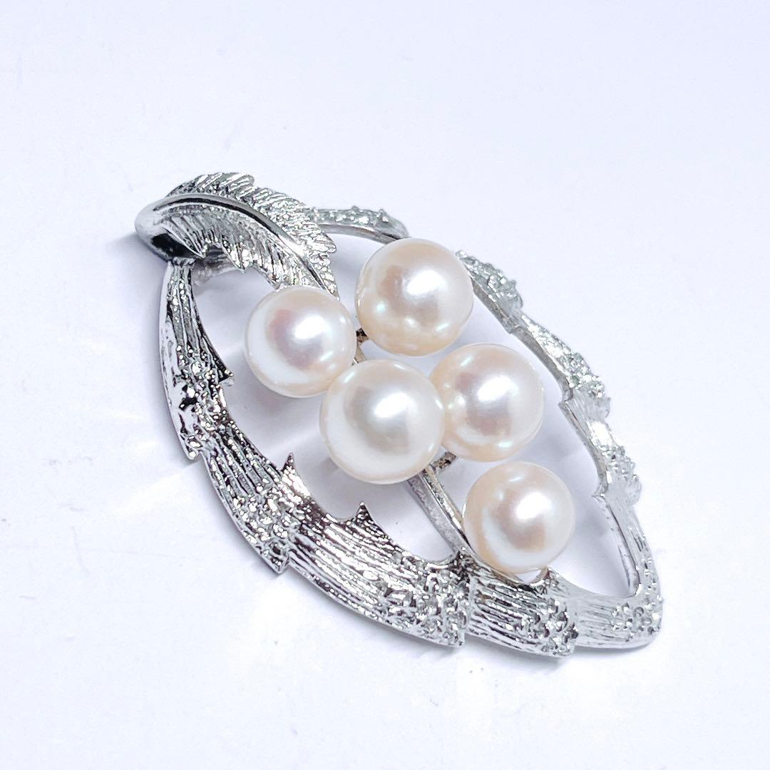 MIKIMOTO pearl necklace top featuring 6.2-6.8mm pearls on silver material shown on white background