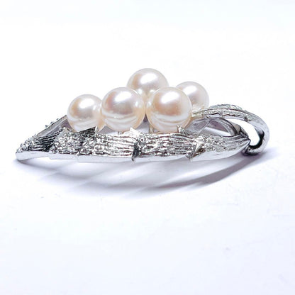 MIKIMOTO pearl necklace top featuring 6.2-6.8mm pearls on silver material shown on white background