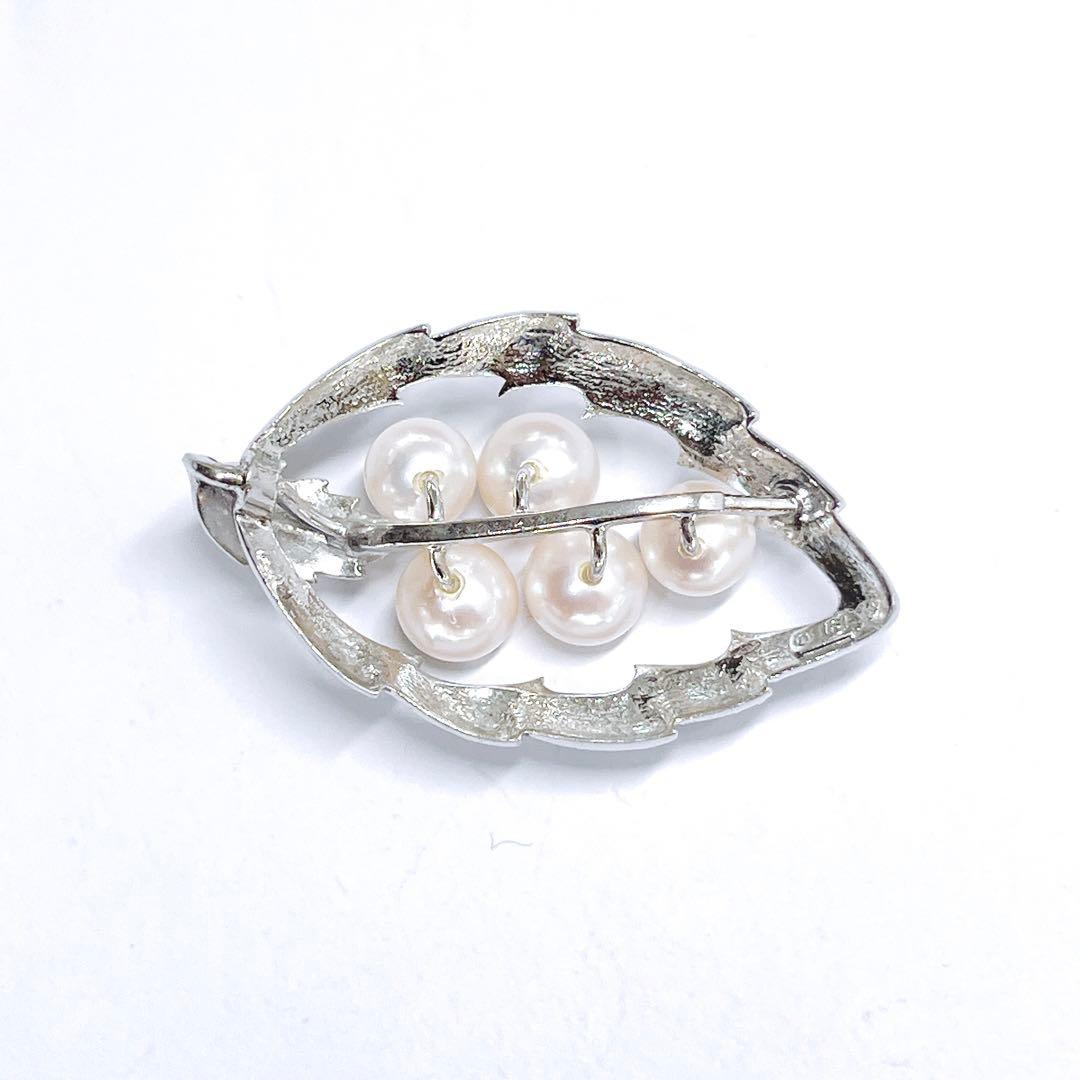 MIKIMOTO pearl necklace top featuring 6.2-6.8mm pearls on silver material shown on white background