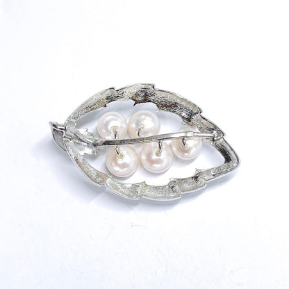 MIKIMOTO pearl necklace top featuring 6.2-6.8mm pearls on silver material shown on white background