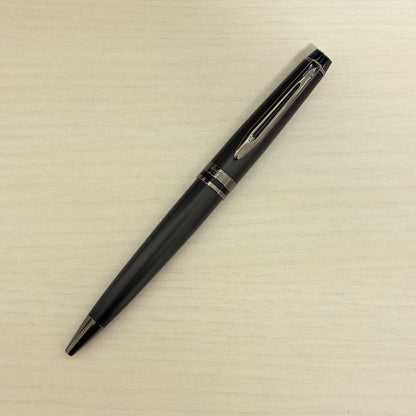 WATERMAN Expert Metallic Black ballpoint pen with included accessories on white background