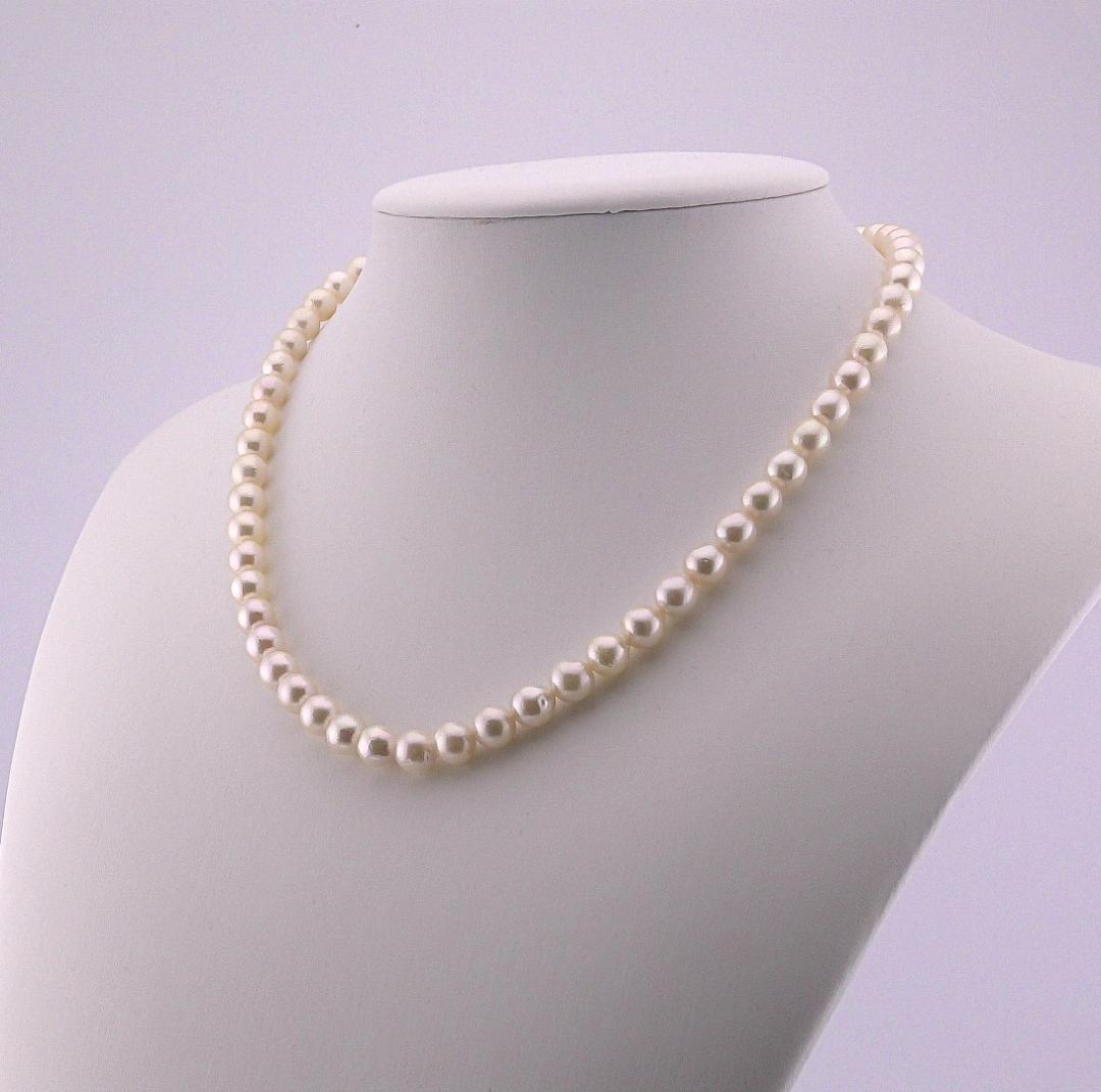 Aoyama pearl necklace featuring 6.5-7.0mm Akoya pearls with silver stamped fittings on a 42cm chain
