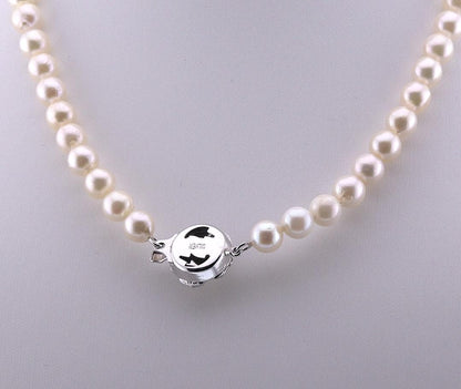 Aoyama pearl necklace featuring 6.5-7.0mm Akoya pearls with silver stamped fittings on a 42cm chain