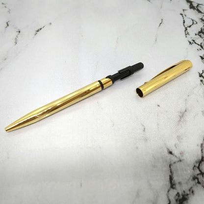 Waterman Torsade ballpoint pen from the 1970s with gold-plated spiral pattern and W monogram on ring