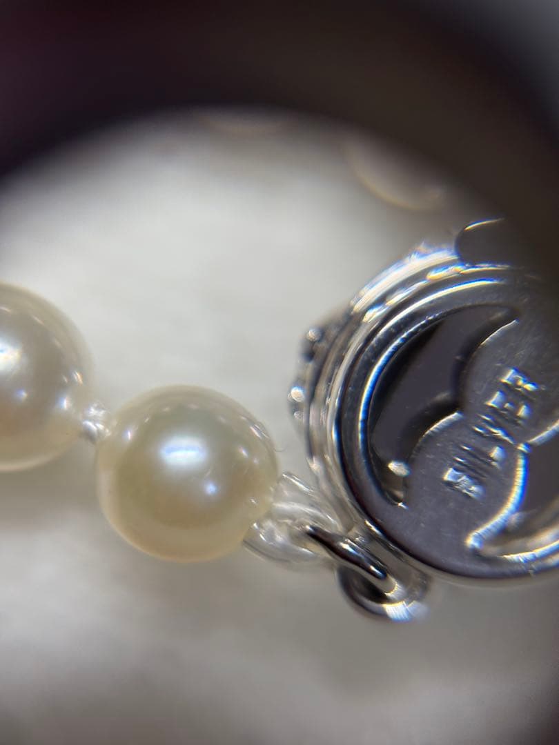 Akoya baby pearl necklace featuring smooth pearls and a silver 925 clasp on a 200mm chain