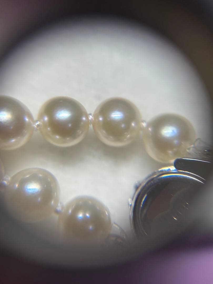 Akoya baby pearl necklace featuring smooth pearls and a silver 925 clasp on a 200mm chain