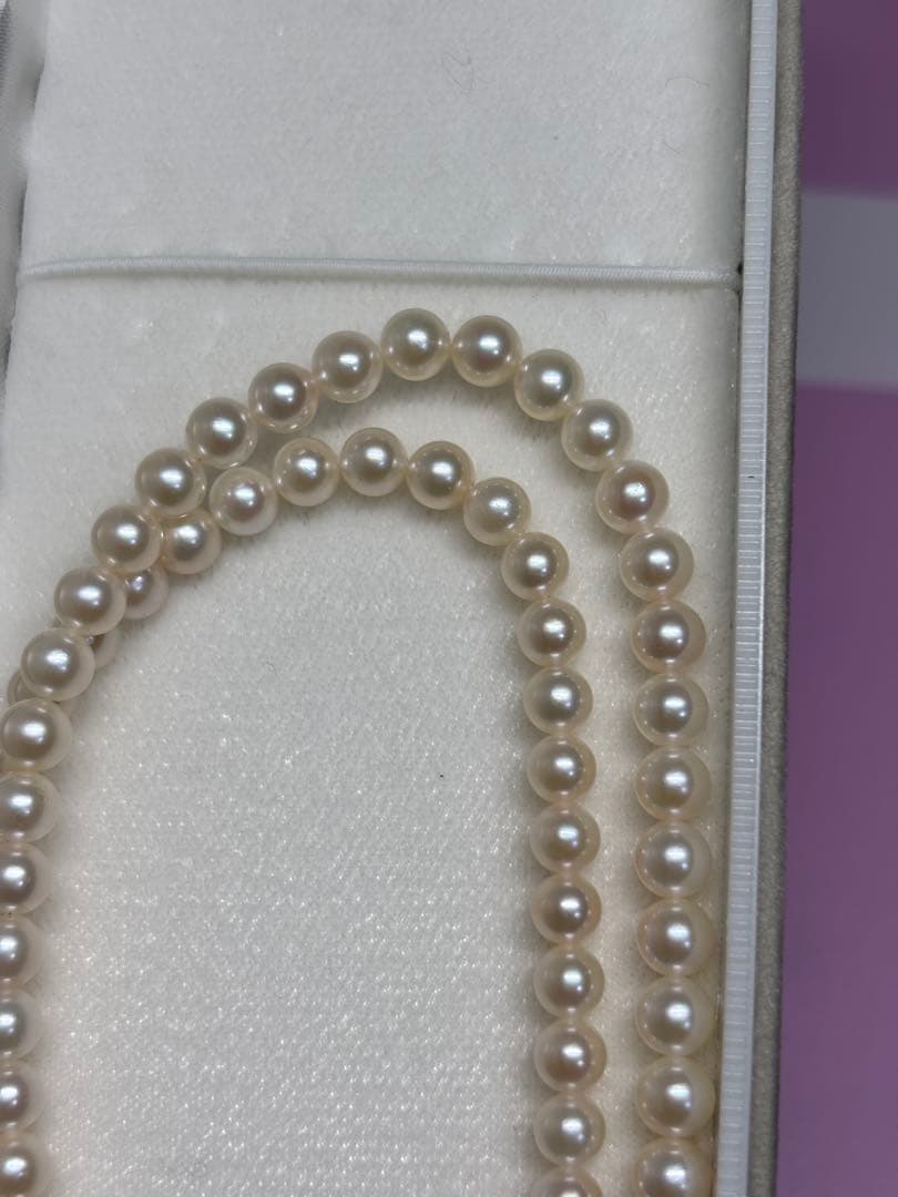 Akoya baby pearl necklace featuring smooth pearls and a silver 925 clasp on a 200mm chain