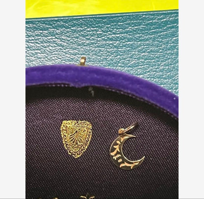 Agete crescent moon pendant charm in 10 karat gold with engraved back design