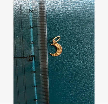 Agete crescent moon pendant charm in 10 karat gold with engraved back design