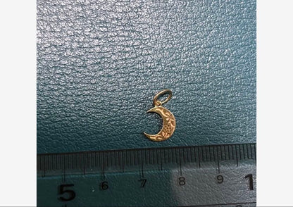 Agete crescent moon pendant charm in 10 karat gold with engraved back design