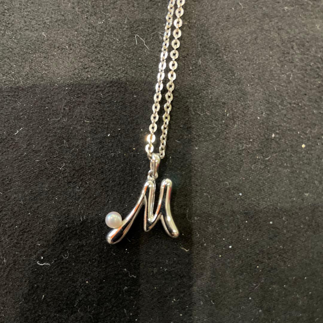 Close-up of Mikimoto pearl jewelry showing pristine pearls with no scratches or discoloration