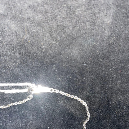 Close-up of Mikimoto pearl jewelry showing pristine pearls with no scratches or discoloration