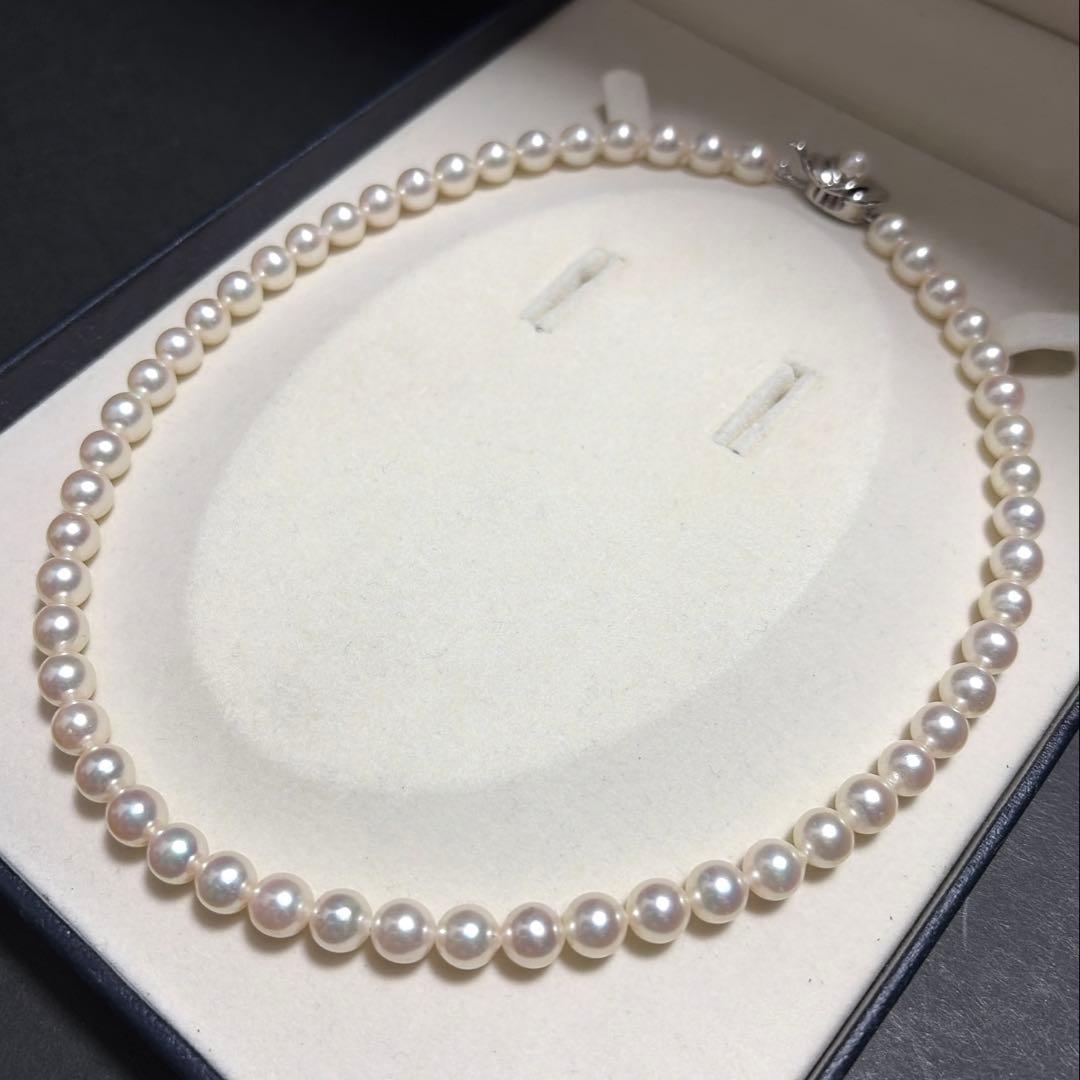 Tasaki Akoya pearl necklace featuring 7.5mm genuine pearls on a 42cm silver chain with high luster