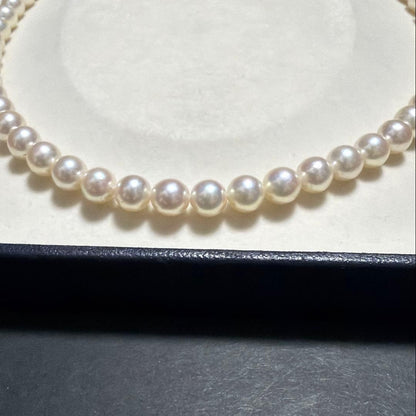 Tasaki Akoya pearl necklace featuring 7.5mm genuine pearls on a 42cm silver chain with high luster