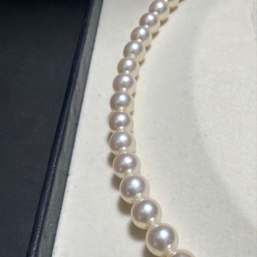 Tasaki Akoya pearl necklace featuring 7.5mm genuine pearls on a 42cm silver chain with high luster