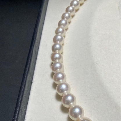 Tasaki Akoya pearl necklace featuring 7.5mm genuine pearls on a 42cm silver chain with high luster