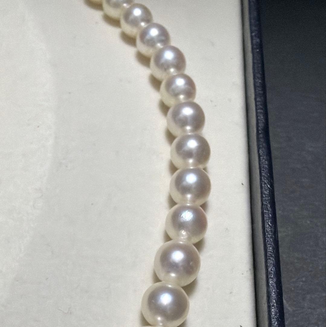 Tasaki Akoya pearl necklace featuring 7.5mm genuine pearls on a 42cm silver chain with high luster