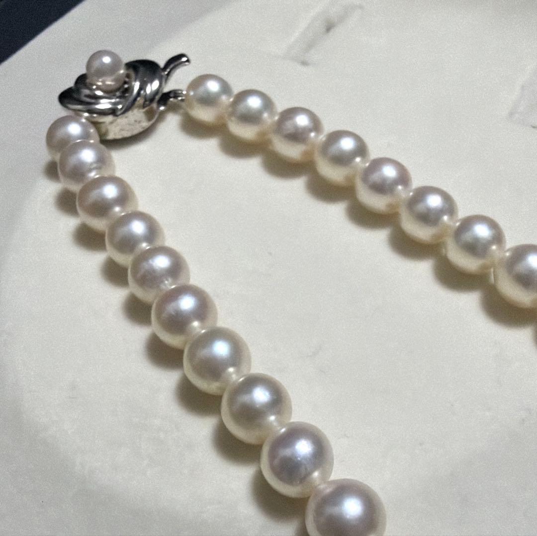 Tasaki Akoya pearl necklace featuring 7.5mm genuine pearls on a 42cm silver chain with high luster