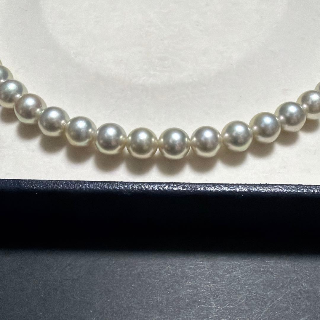 TASAKI Akoya Pearl Necklace with 7.5mm pearls, 42 cm length, displayed on white background