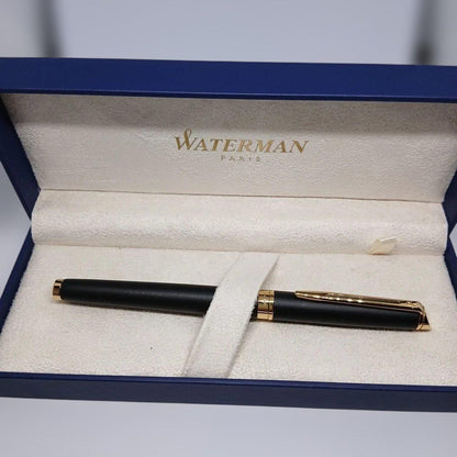 Waterman Matte Black Fountain Pen with fine nib and metal body displayed with case and instruction manual