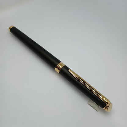 Waterman Matte Black Fountain Pen with fine nib and metal body displayed with case and instruction manual
